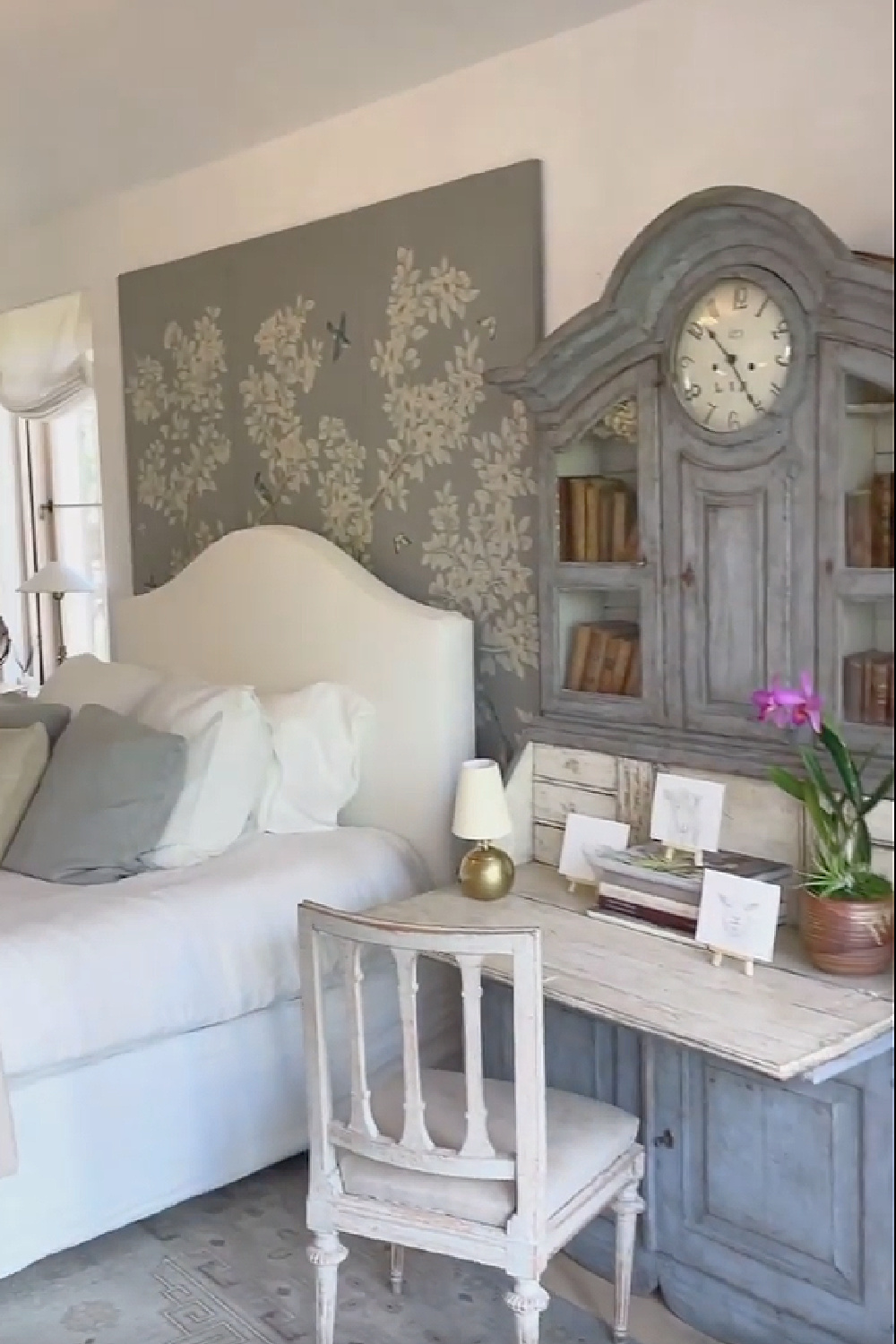 Chalky blue grey is stunning in a Gracie Studio wallcovering and antique Swedish desk in a bedroom by Giannetti Home at Patina Farm. #bedroomdecor #frenchfarmhouse #swedishantiques #nordicfrench #patinafarm