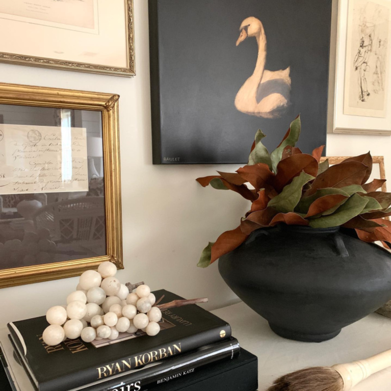 Gorgeous gallery wall and styled vignette by Sherry Hart. #interiordesign #gallerywall #blackandwhite