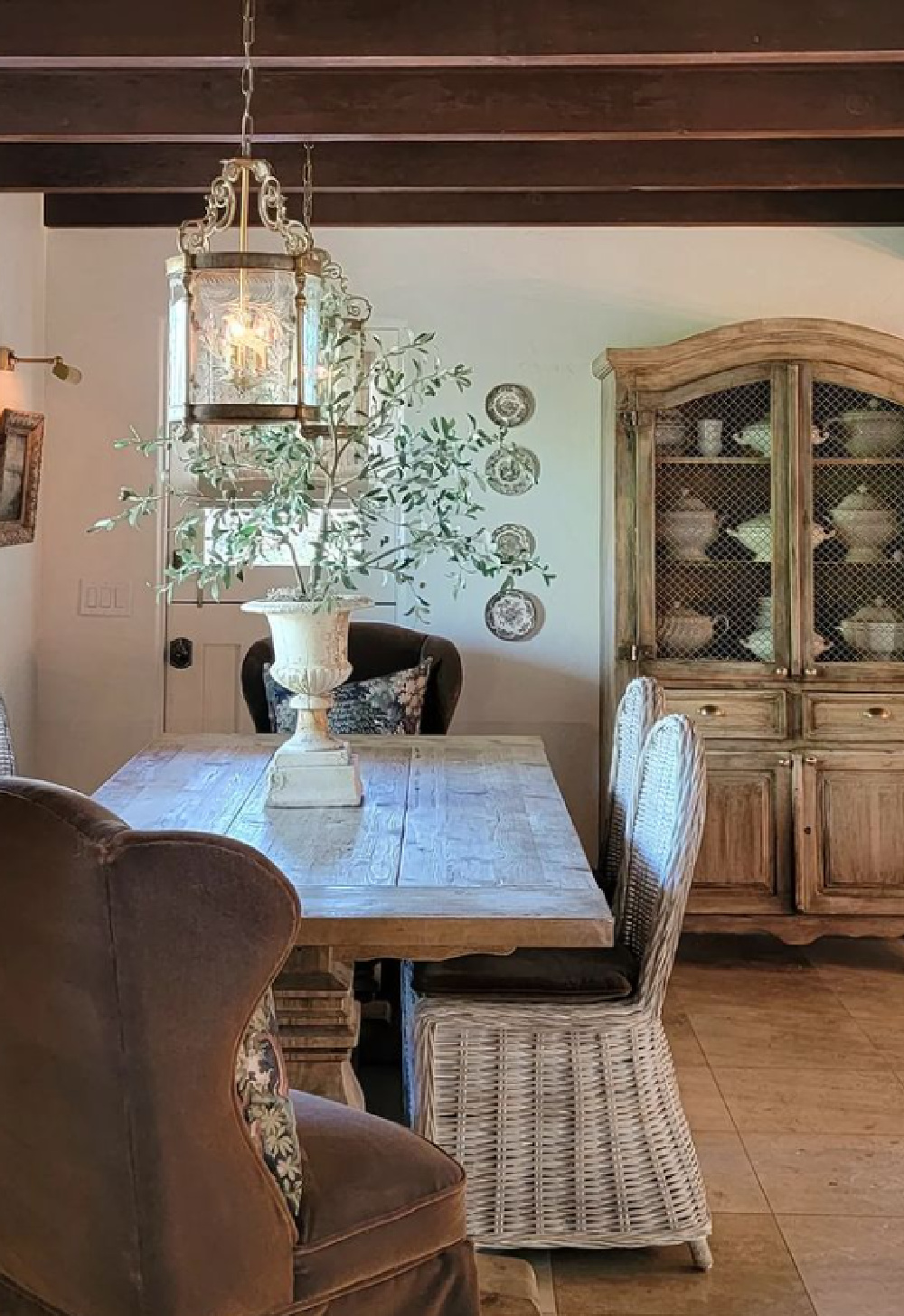 Charming French country dining room with farm table and antiques - design by TheFrenchNestCoInteriorDesign. #diningrooms #frenchcountry