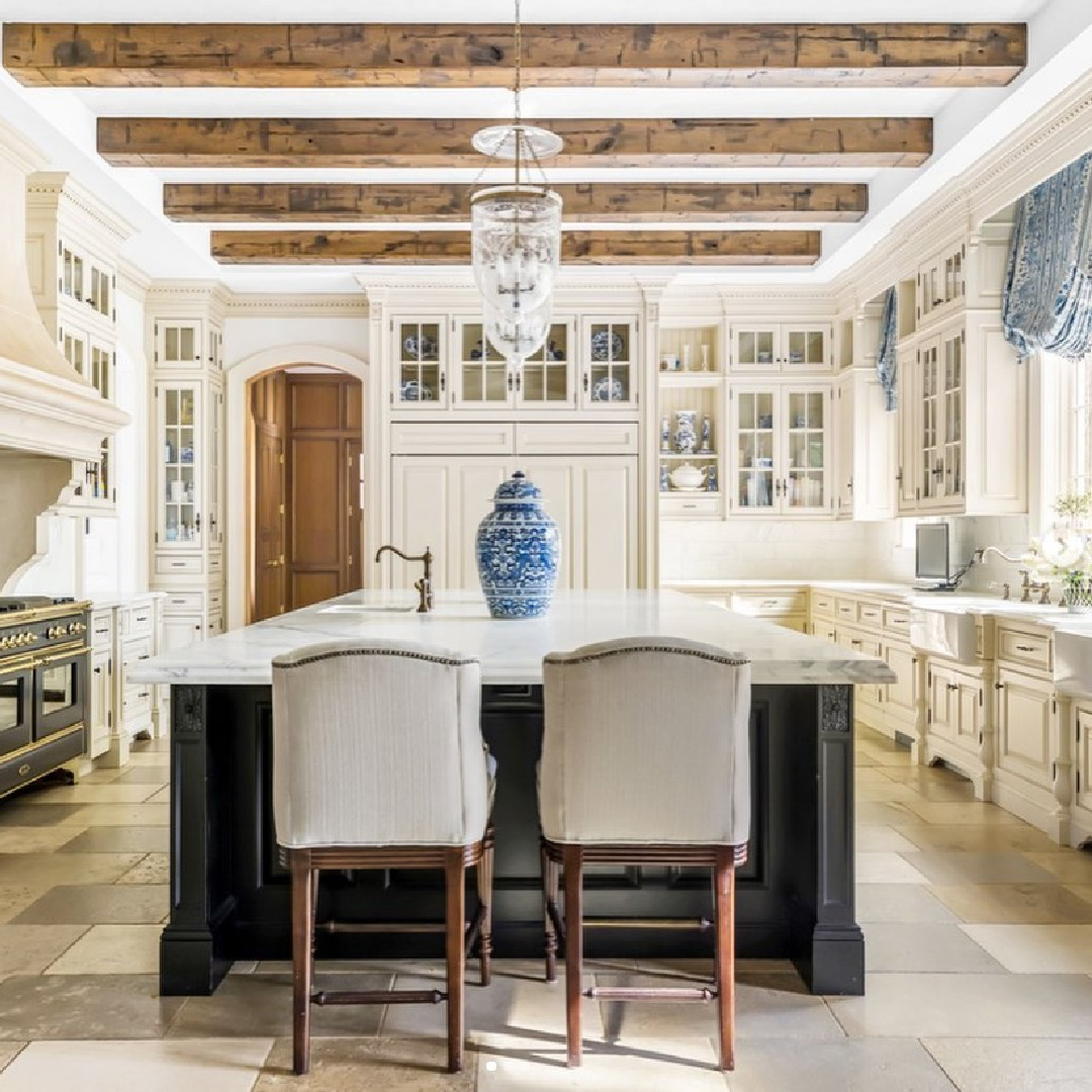The Enchanted Home: Tina's beautiful country French kitchen with black island, French range, and rustic wood beams...elegant! #theenchantedhome #frenchcountrykitchen
