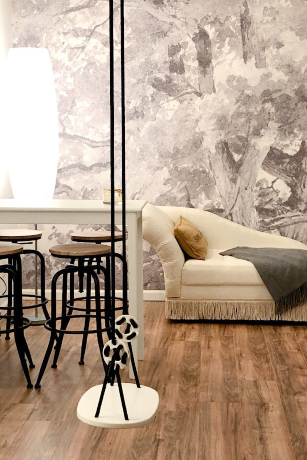 Make a bold statement in a boring space like I did in our finished basement - come see the easy 2 hour installation of a wallpaper mural - Hello Lovely.