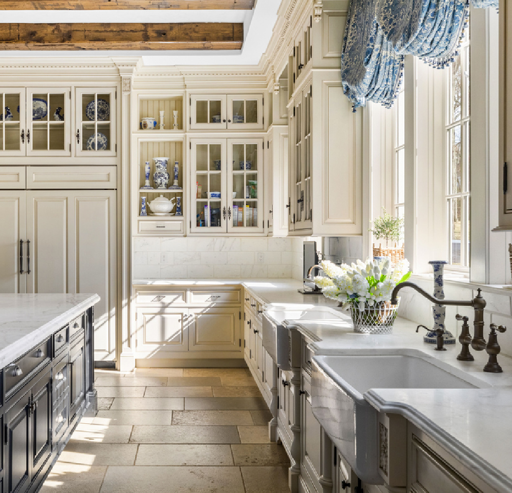 Magnificent traditional French country kitchen with blue and white accents - The Enchanted Home. #frenchkitchen #frenchcountrykitchen