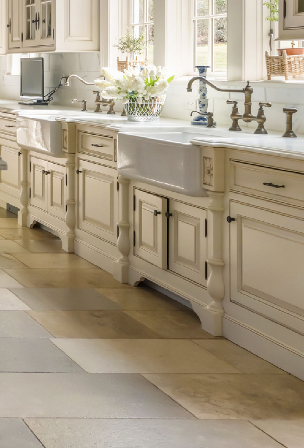 Magnificent traditional French country kitchen with blue and white accents - The Enchanted Home. #frenchkitchen #frenchcountrykitchen