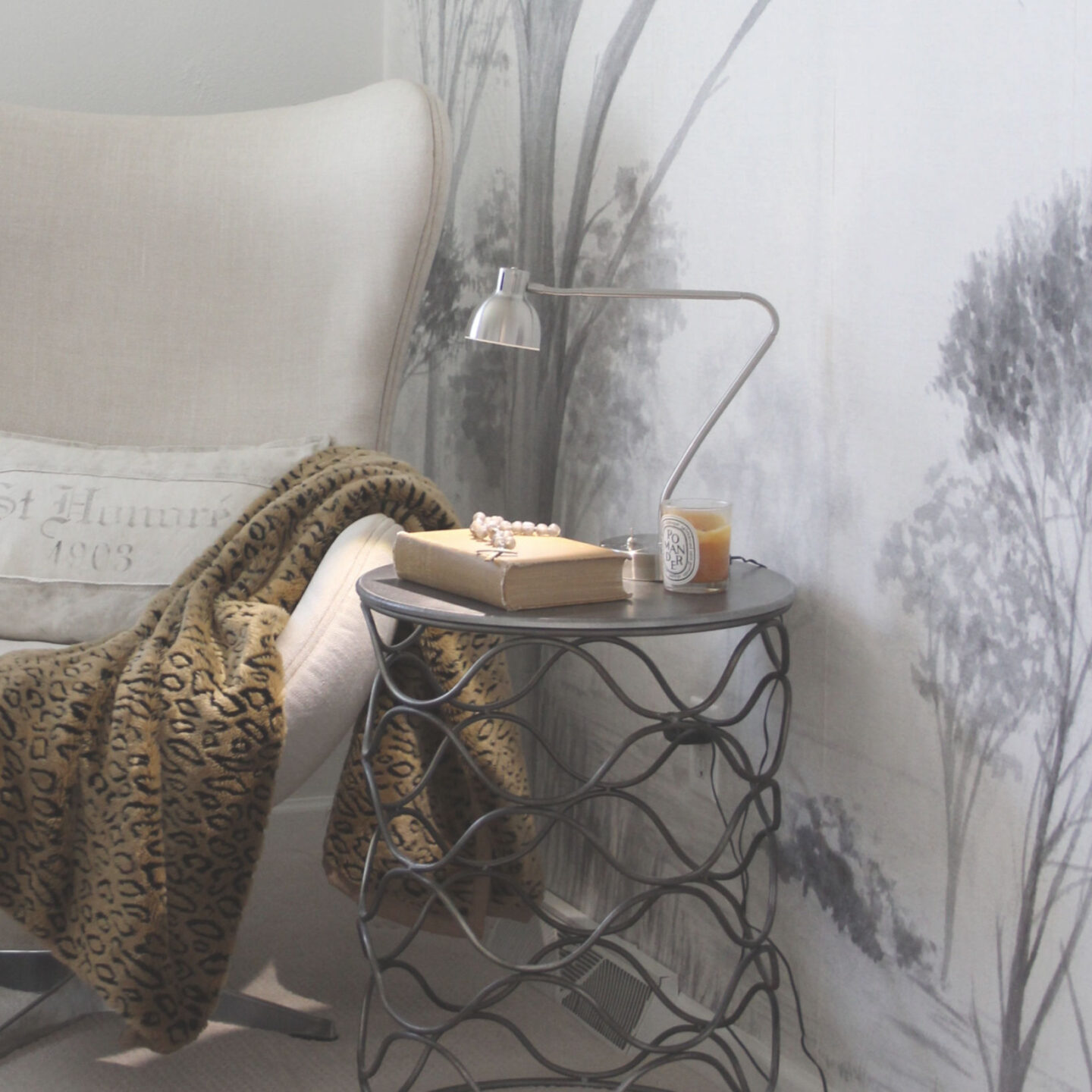 Serene neutral sophisticated decor in a bedroom with grisaille wallpaper mural (Photowall), Copenhagen chair (RH), animal print throw and drum table - Hello Lovely Studio. #eggchair #mural #grisaille #interiordesign