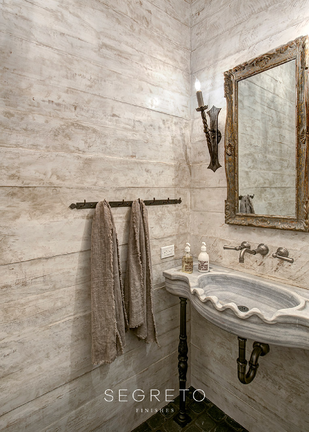 Old World style and rustic elegance converge in a lovely bath with plaster finishes and sophisticated fixtures - Segreto Finishes. #oldworldstyle #plasterwalls #frenchcountrybathroom