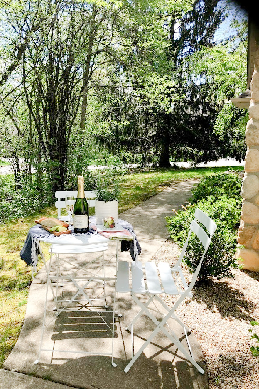 White Parisian style cafe dining set is perfect for small spaces and casual dining when you love a little romance - Hello Lovely.