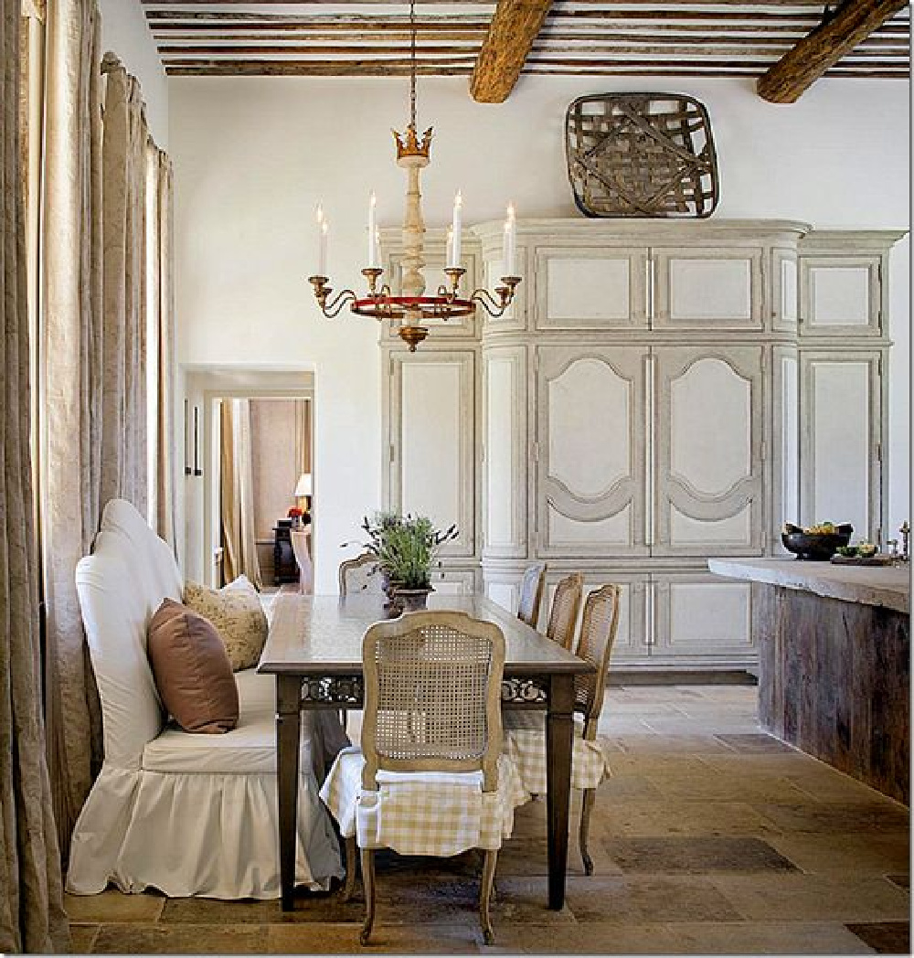 Exquisite French country kitchen with chandelier, large armoire, and stone flooring - via CotedeTexas. #frenchkitchen #breakfastnook #frenchcountrydesign