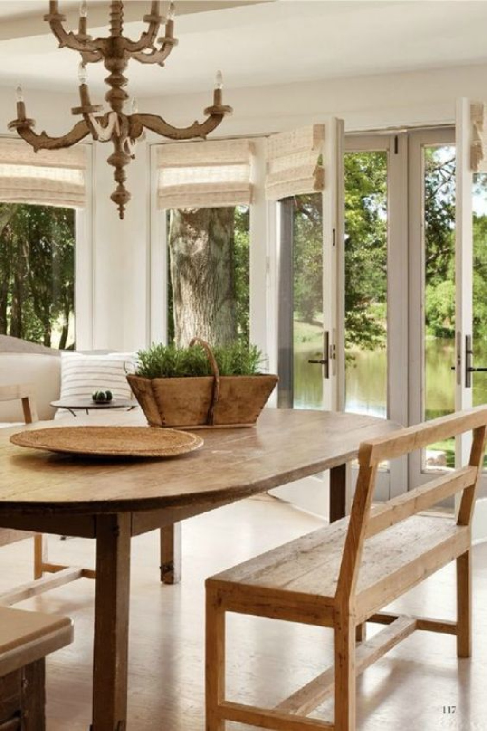 Rustically elegant French farmhouse kitchen dining area with antiques from Europe - Shannon Bowers. #frenchfarmhouse #frenchkitchen