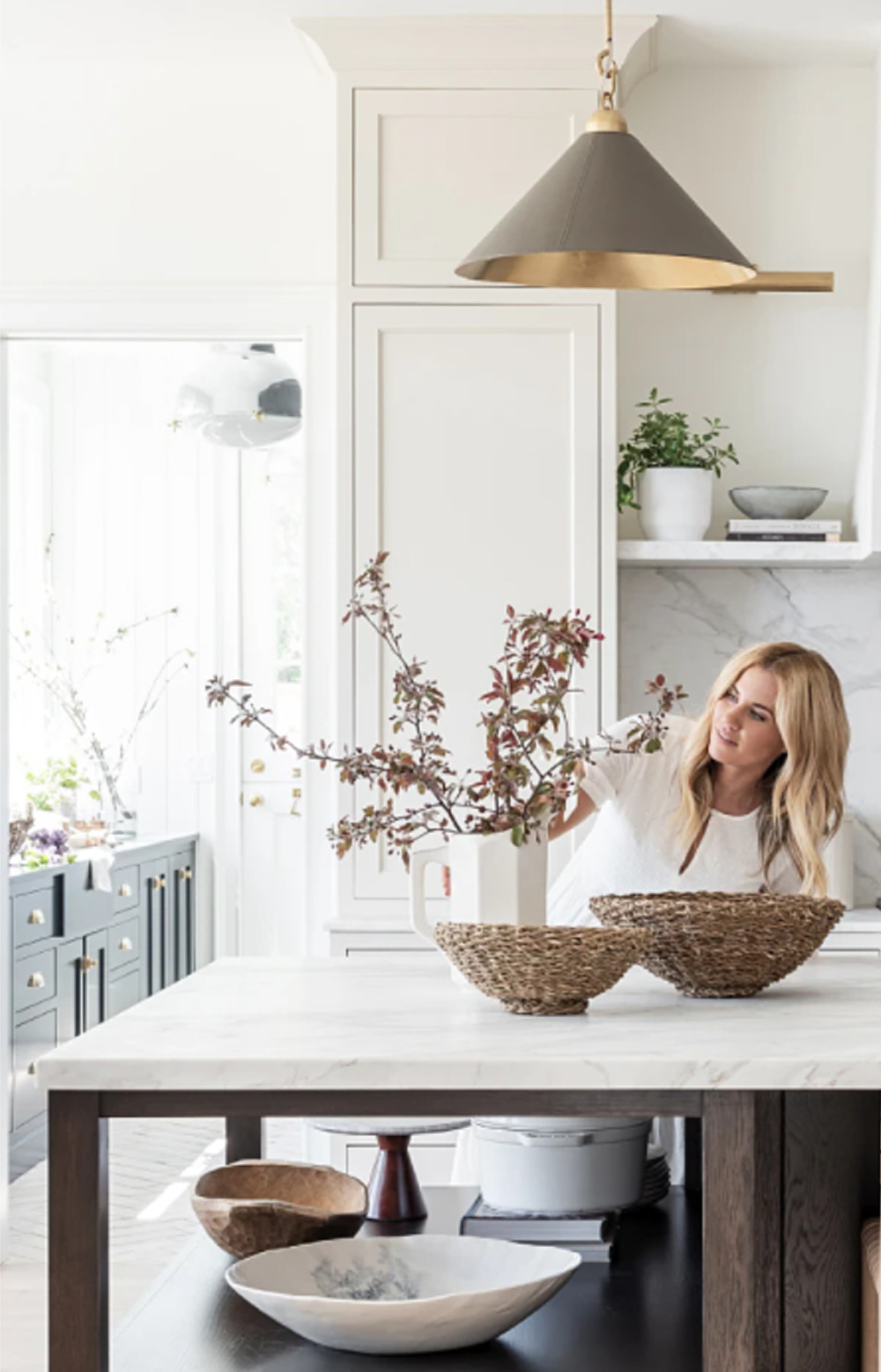 Beautiful classic modern farmhouse white kitchen island with wood open shelves beneath - McGee & Co. #whitekitchens #modernfarmhosue #serenekitchens