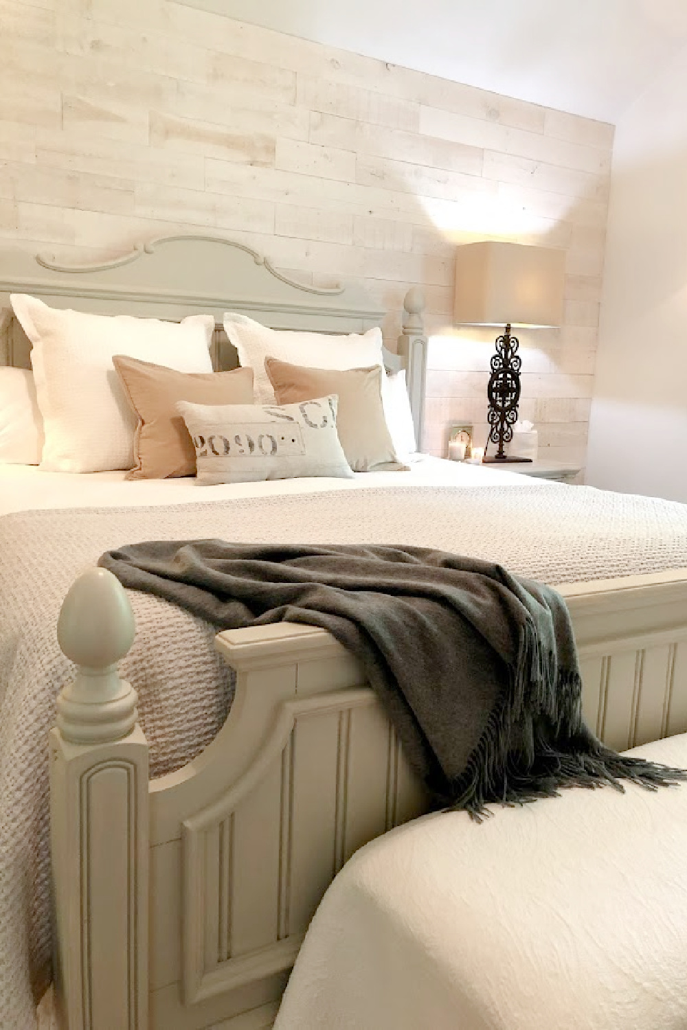 Charcoal cashmere throw in soothing and serene neutral bedroom with European country cottage style and Stikwood planked wall - Hello Lovely. Furniture is painted #reverepewter