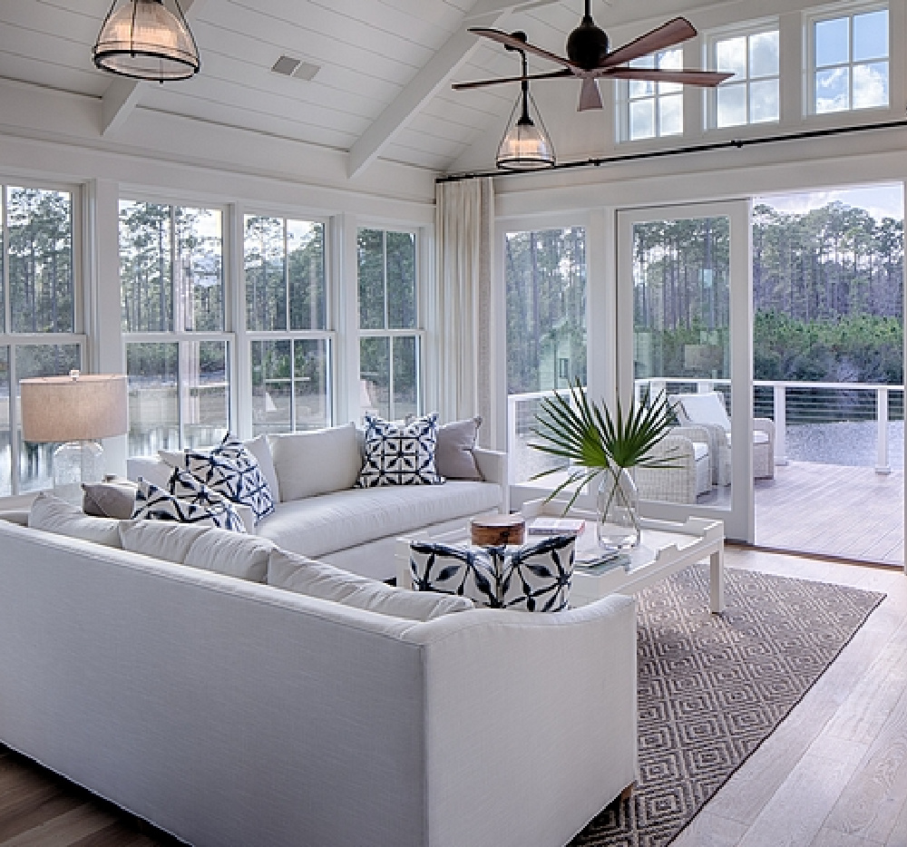 Living room. Board and batten coastal cottage in Palmetto Bluff with modern farmhouse interior design by Lisa Furey.