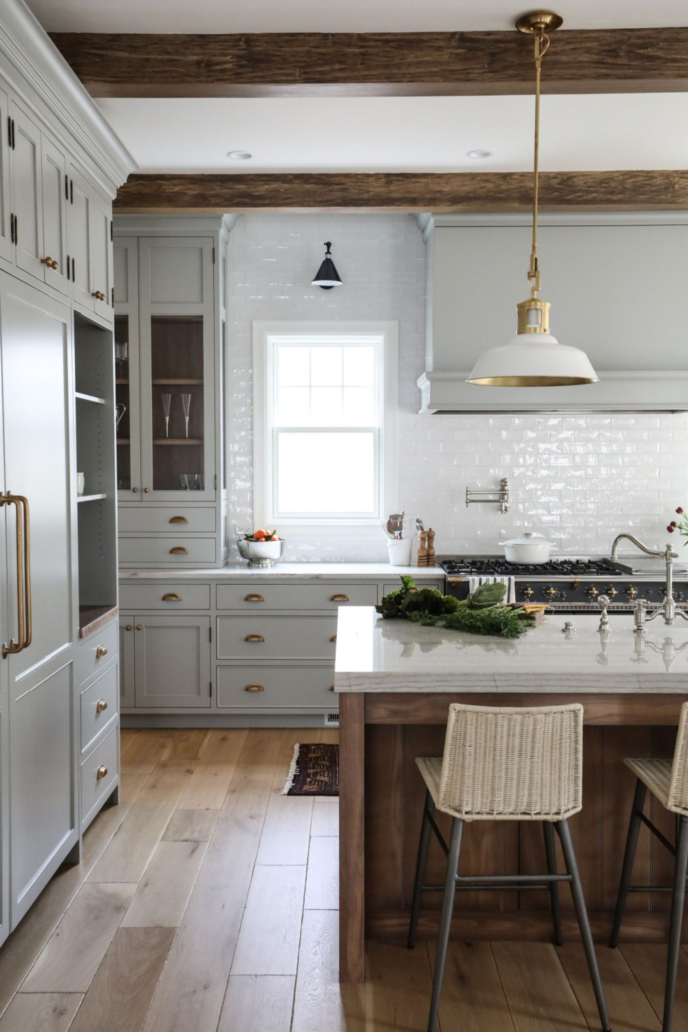 Lamp Room Gray cabinets in a traditional kitchen with classic style and sophistication from Park & Oak. #farrowandballlamproomgray