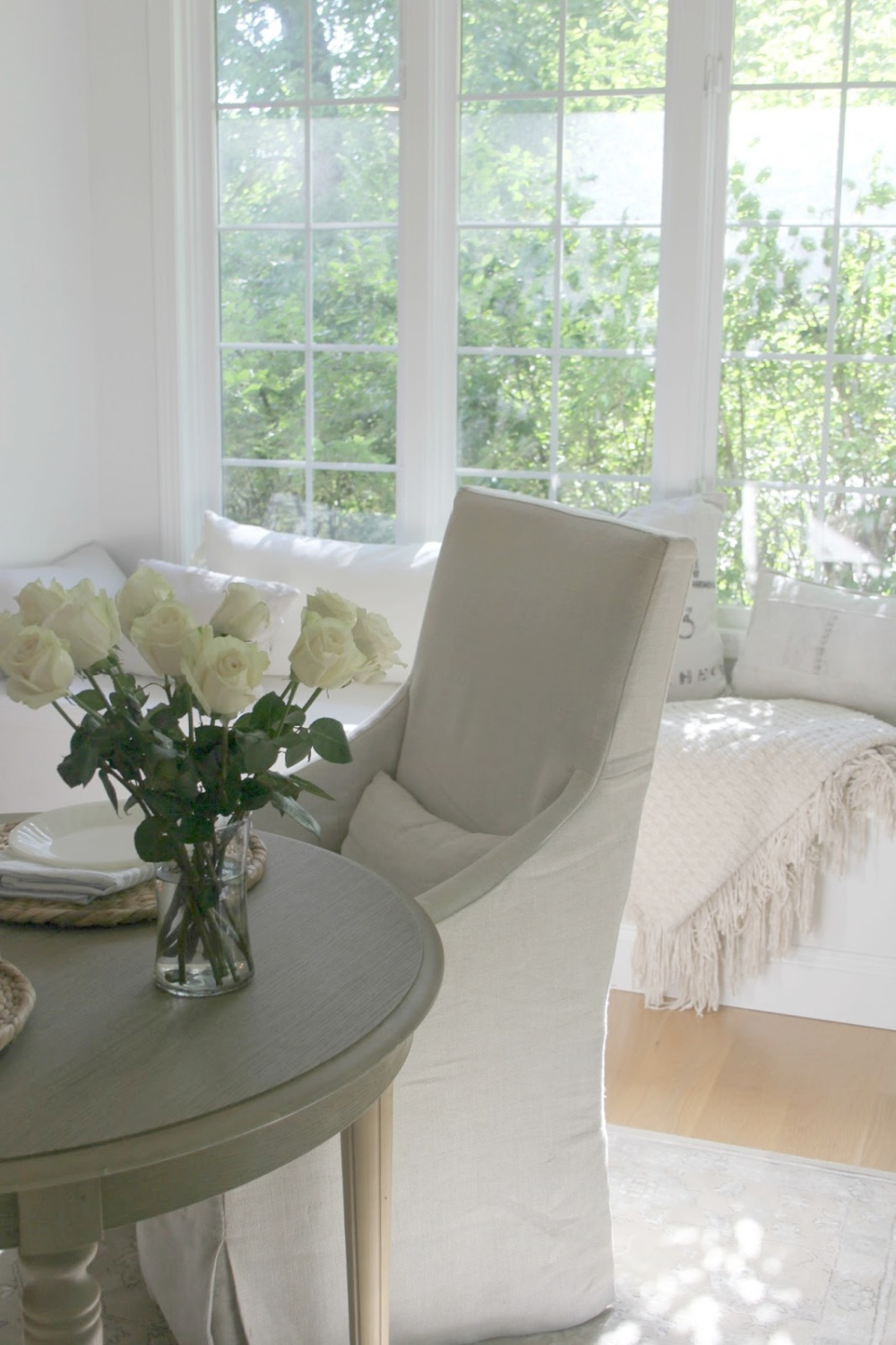 White serene kitchen with window seat - Hello Lovely Studio