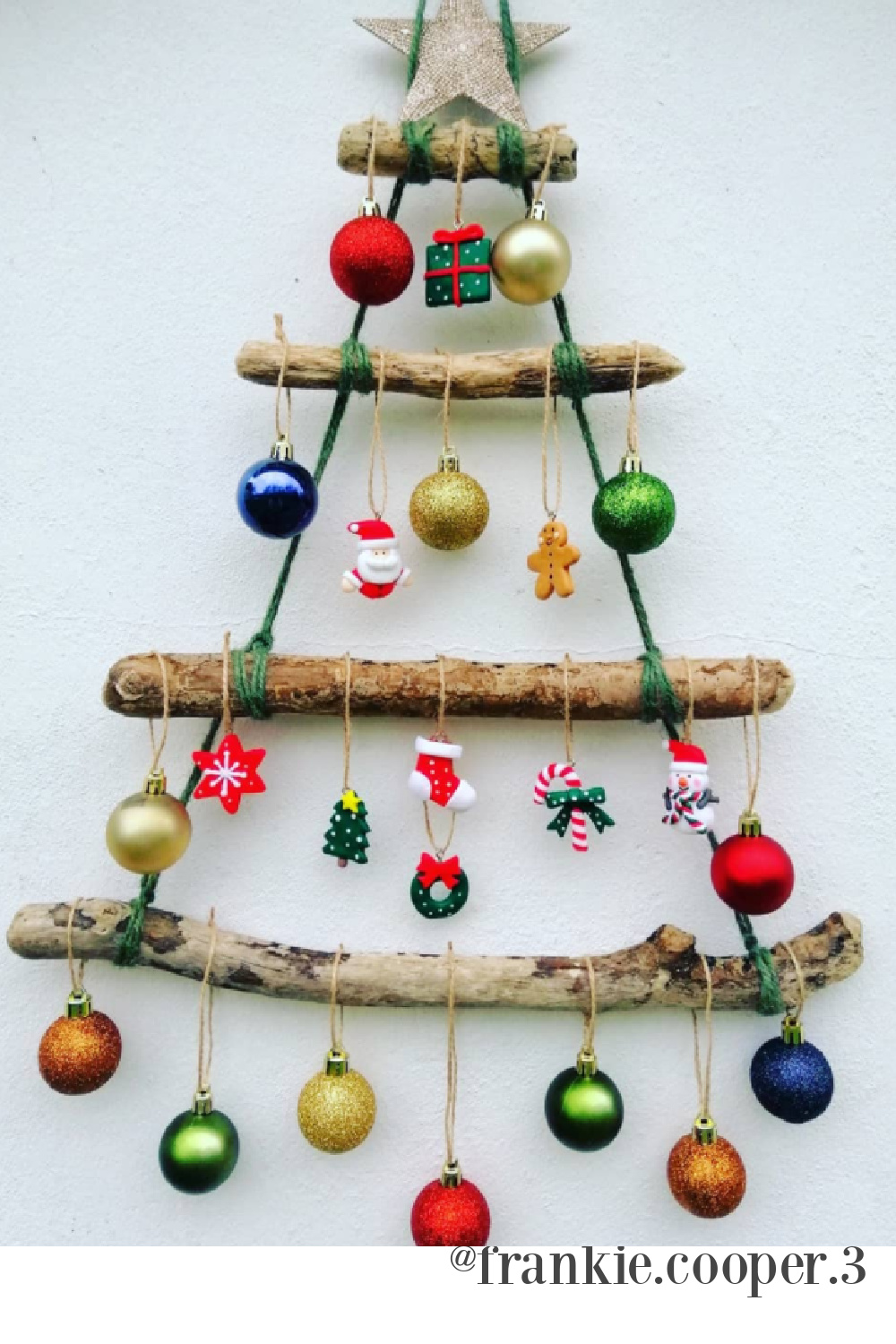 Driftwood Christmas tree with colorful ornaments - @frankie.cooper. #driftwoodtree #christmastrees