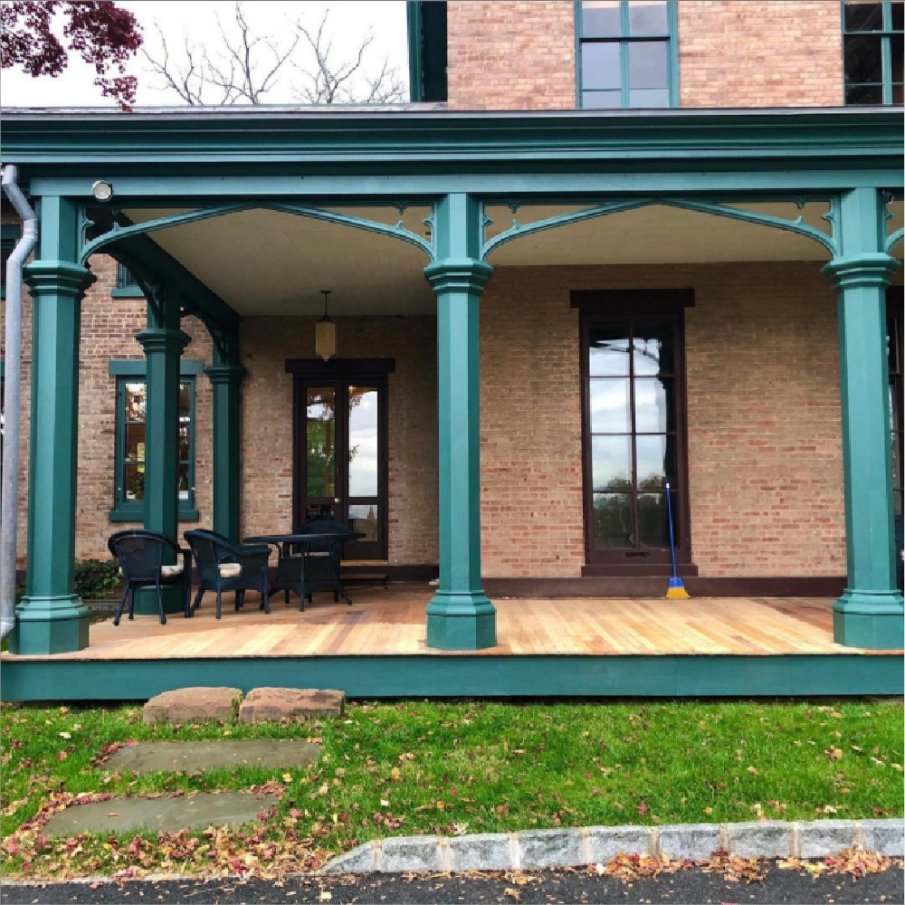 Tarrytown Green paint color (Benjamin Moore) on trim of a beautiful historic rick home - @rosshand1859. #tarrytowngreen #benjaminmooretarrytowngreen #paintcolors