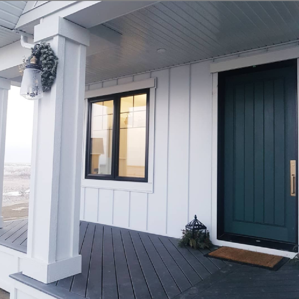 Tarrytown Green painted front door (Benjamin Moore) on a white house - Lauren Bennett Interiors. #tarrytowngreen #greendoor #frontdoorcolors