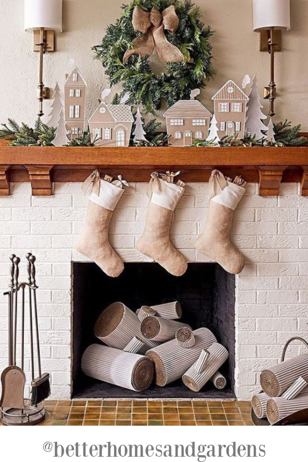 White Christmas decorated white brick fireplace - BHG. #christmasfireplace #christmasstockings #holidaydecor