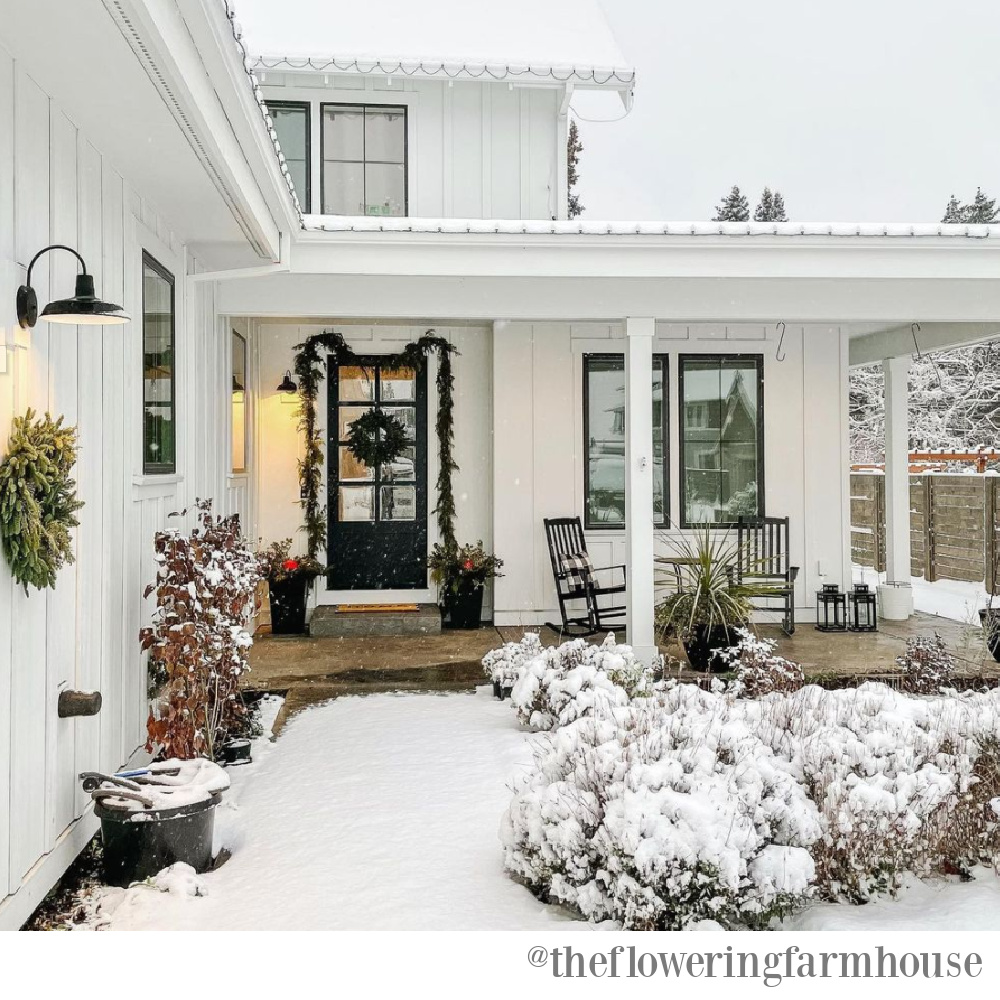 Farmhouse Christmas decor and a beautiful winter porch - The Flowering Farmhouse. #farmhousechristmas #christmasdecor