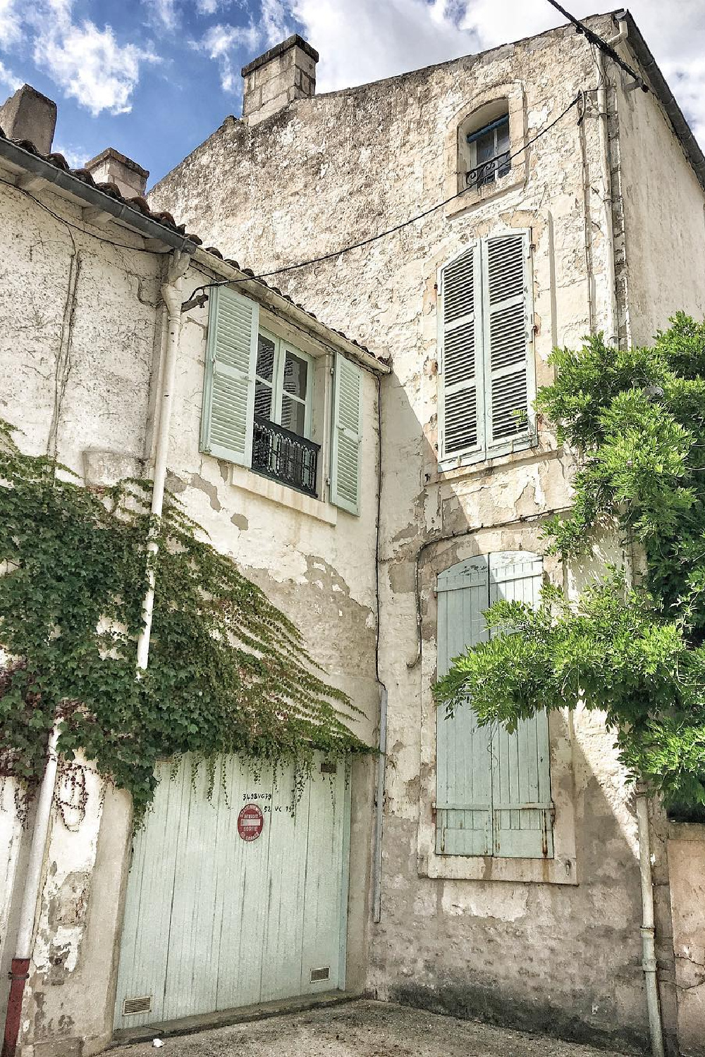 French farmhouse stone exterior with light green shutters - Vivi et Margot. #farmhouseexterior #countryhouses #frenchcountryhome