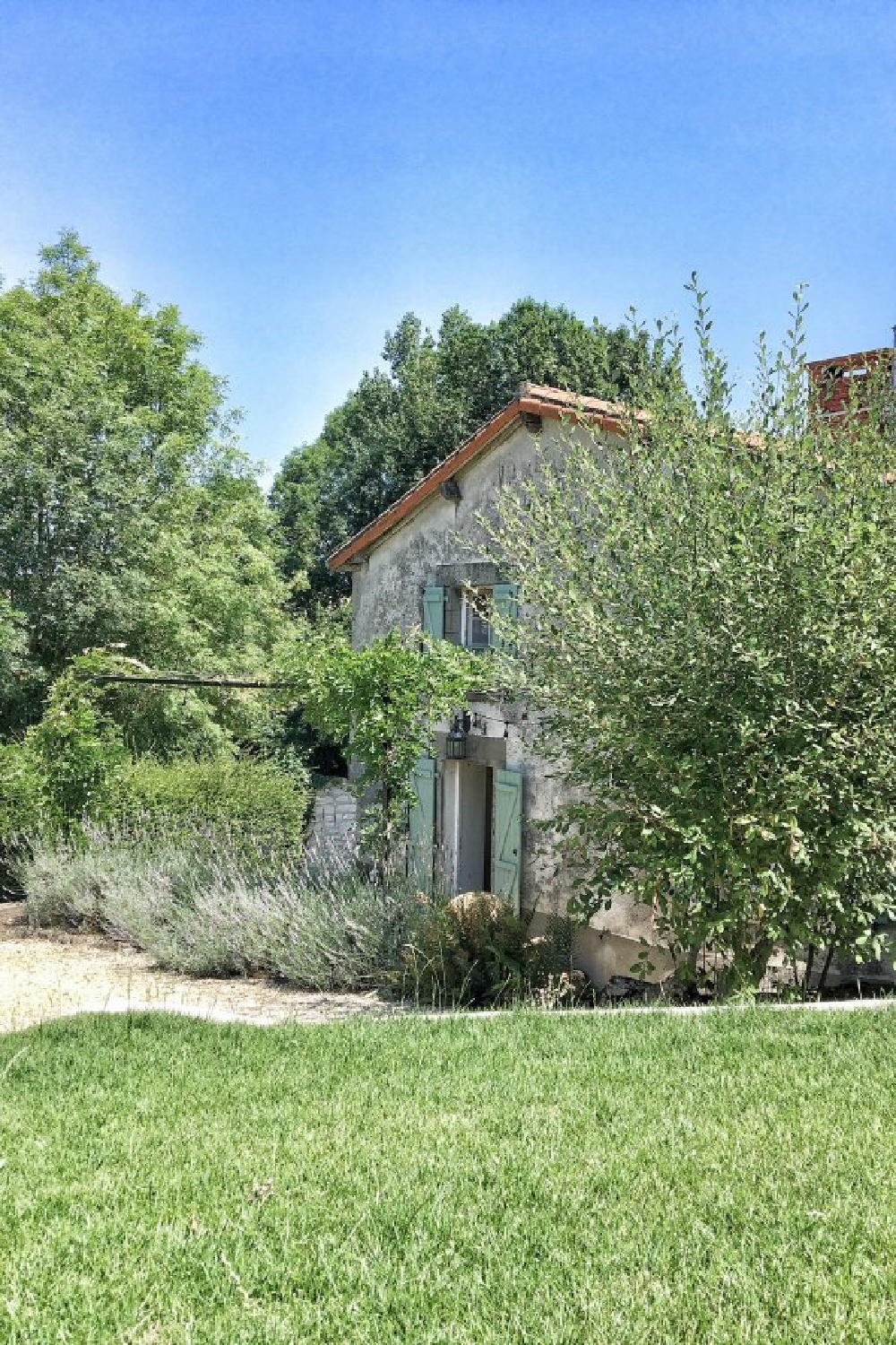 French farmhouse stone exterior with light green shutters - Vivi et Margot. #farmhouseexterior #countryhouses #frenchcountryhome