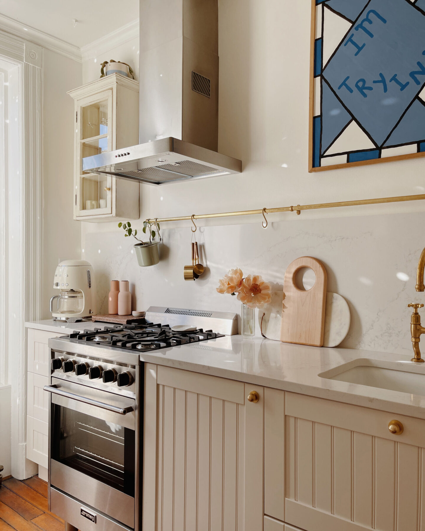 Gorgeous Nieu Cabinet Doors in ReserveHome's Brooklyn Brownstone remodeled kitchen. #customkitchen #cabinetrefacing #kitchenremodel #beforeandafter