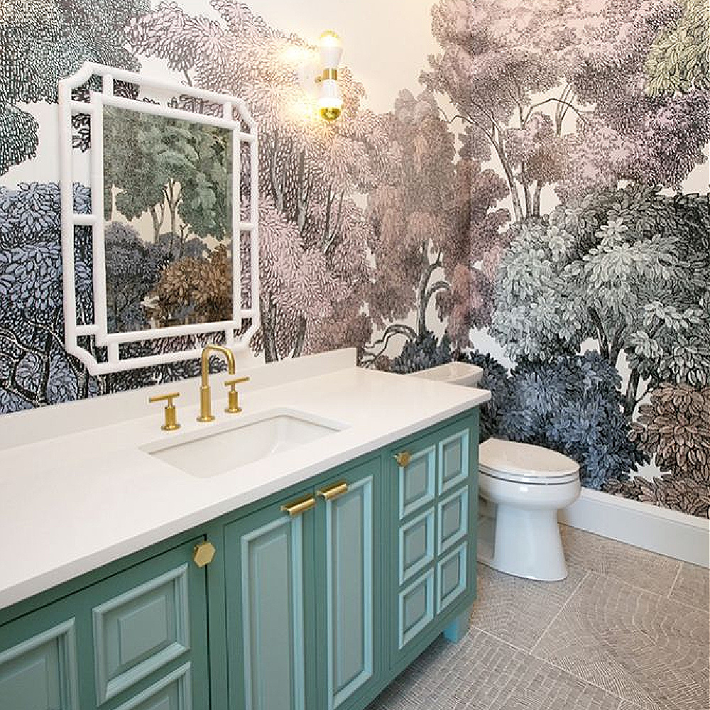 Caesarstone Pure White quartz countertop in a beautiful bath with green vanity and a landscape wallpaper mural - design by Whittney Parkinson. #caesarstonepurewhite #whitequartz