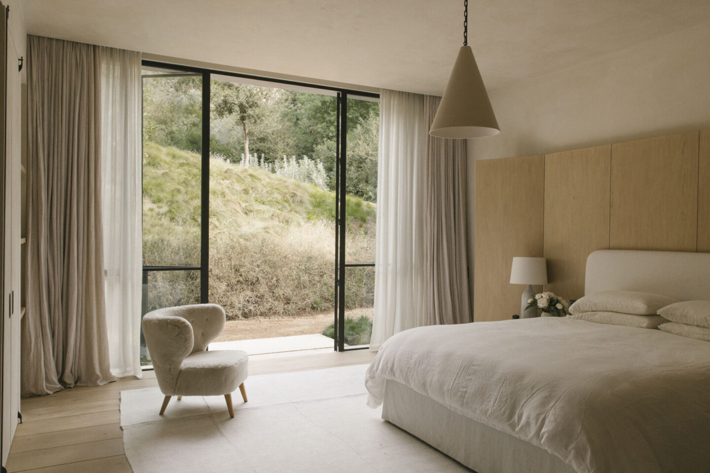 Quietly serene bedroom in Pacific Natural at Home - Jenni Kayne. #californiacalm