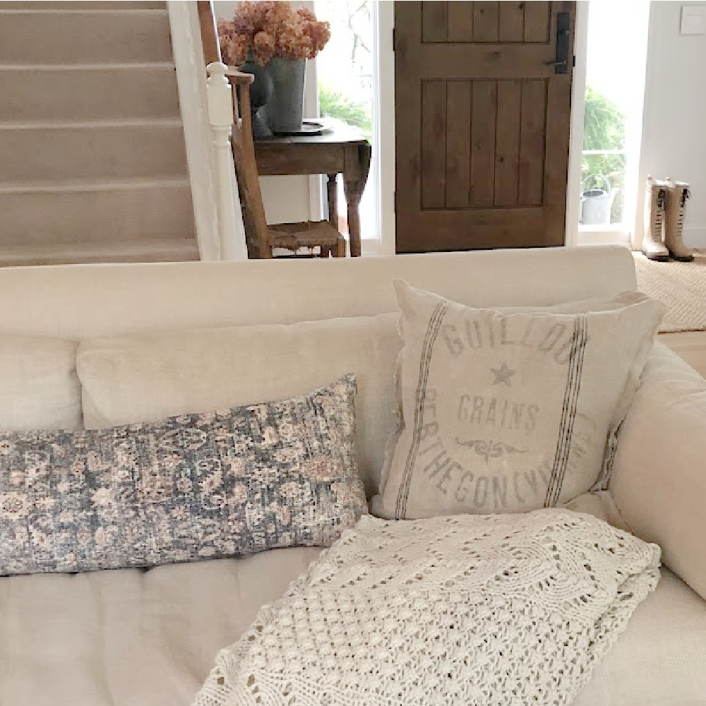 Montara pillow (Amber Lewis x Loloi) on my Belgian linen slope arm sofa by RH - Hello Lovely Studio.