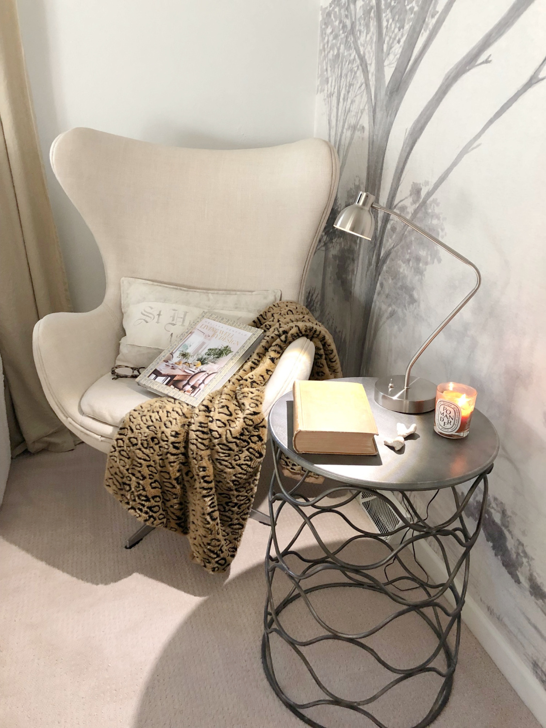 Cozy Copenhagen egg chair with Belgian linen upholstery in a bedroom with grisaille wall mural - Hello Lovely Studio.