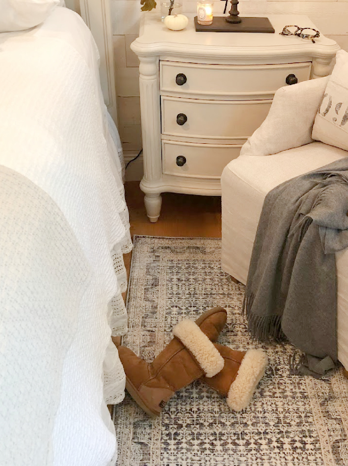 Ugg tall boots in Hello Lovely's fall bedroom with Zuma Zum ocean area rug (Amber Lewis x Loloi).