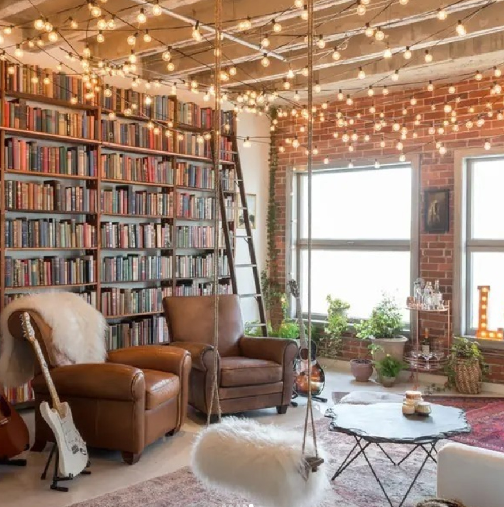 Behler Homes designed cozy home library with built-ins and sheepskin covered swing.