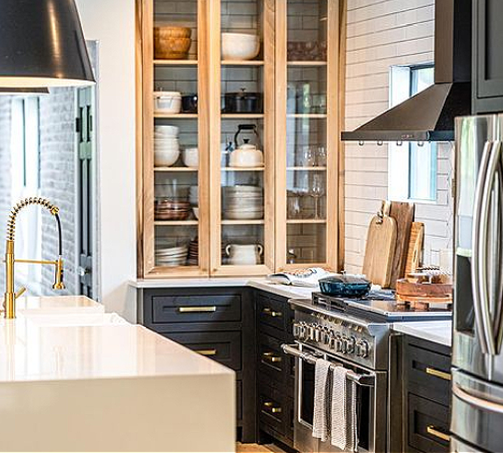 SW Tricorn Black painted base cabinets in kitchen by Havenstudiodesign. #tricornblack #swtricornblack #paintcolors