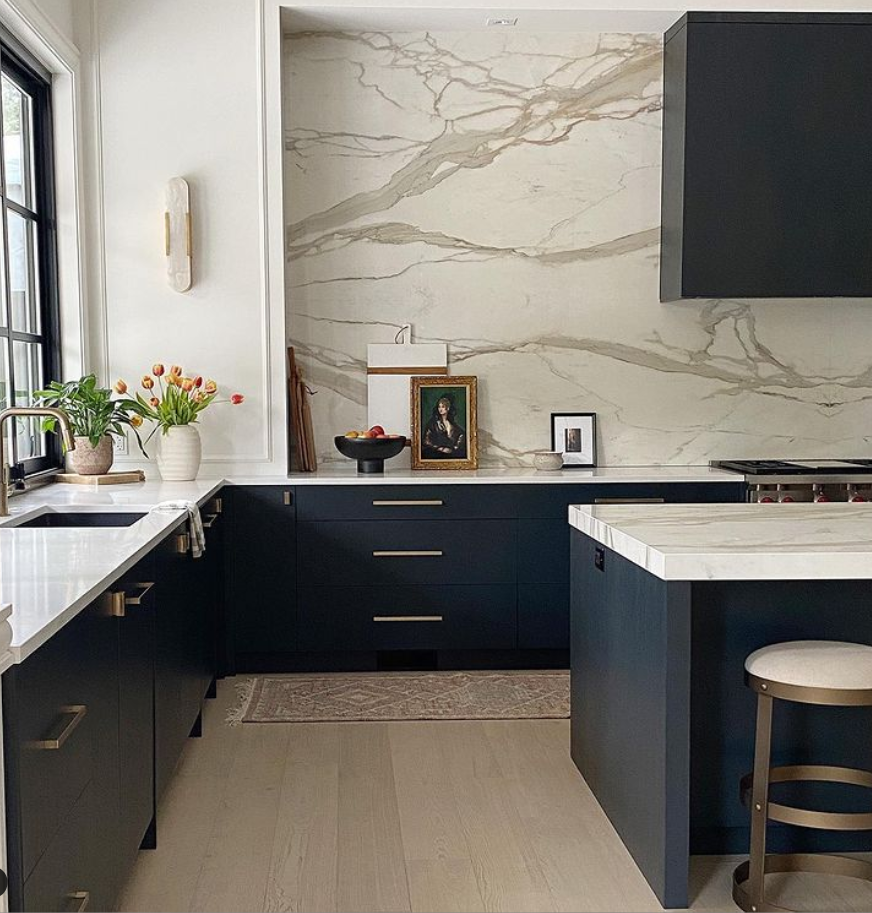 Elegant chic black kitchen by Tom Lenovich Design. #blackkitchencabinets