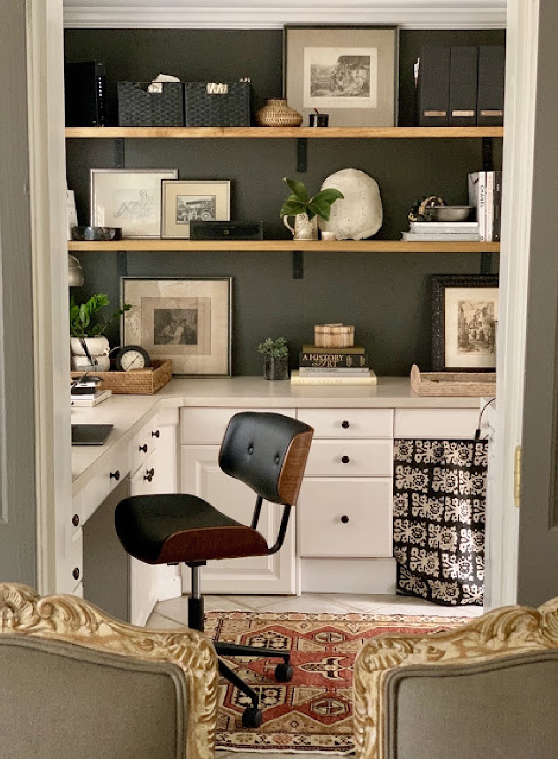Beautiful home office with open shelves and neutral decor - Sherry Hart Interiors. Paint color is BM Iron Mountain. #paintcolors #ironmountain #homeoffices