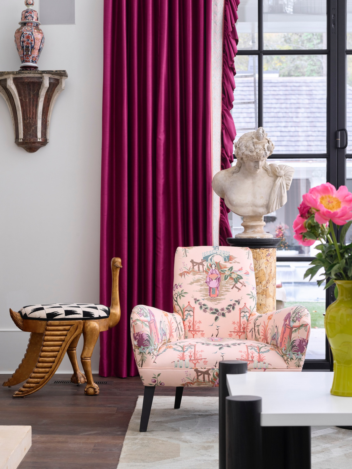 Atlanta Home for the Holidays Designer Showhouse great room by Brittany Cason Johnston with unusual pink chair and bust. #traditionaldesign #interiordesign