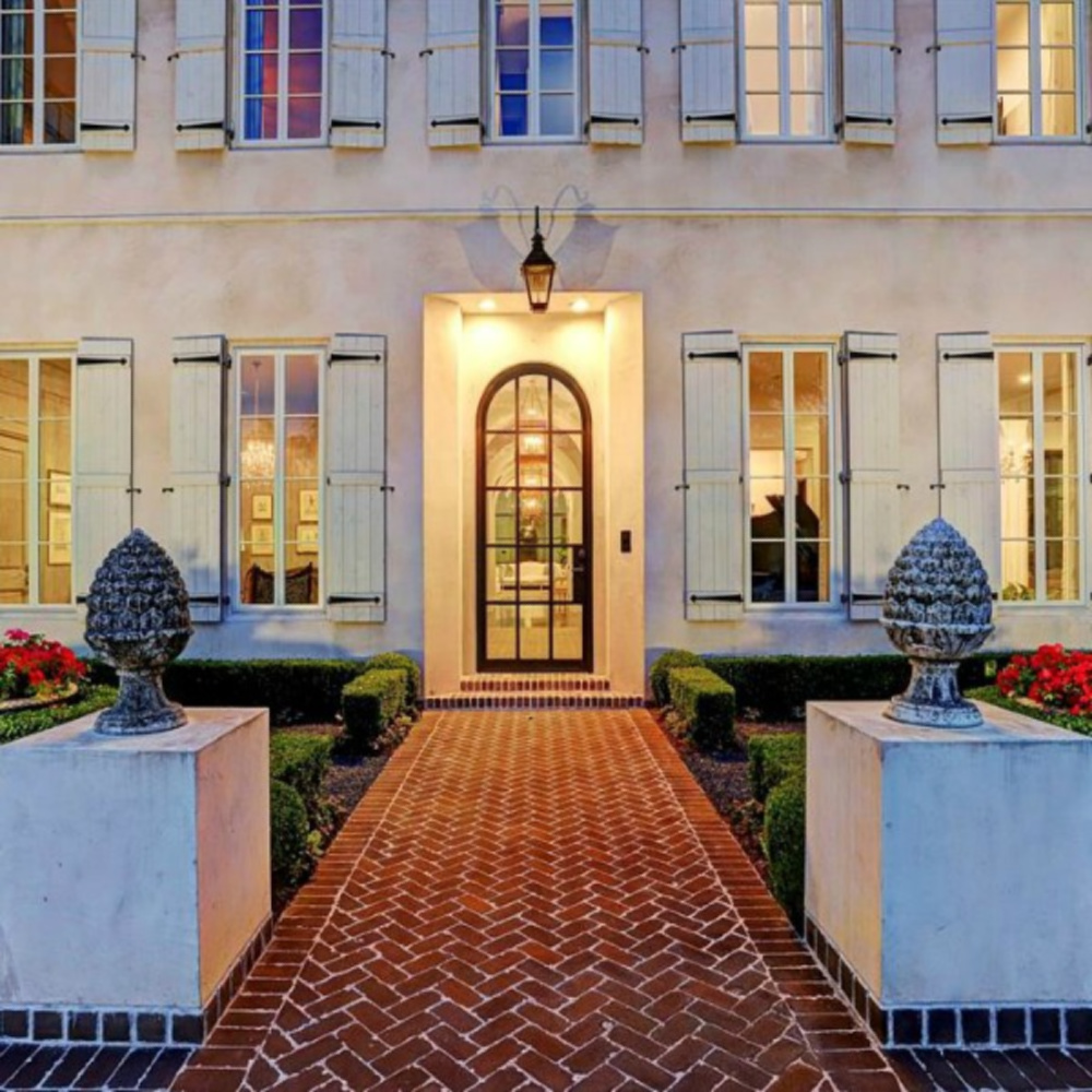 Magnificent French country exterior of a Houston mansion by Thomas O'Neill Homes. #frenchcountry #houseexterior #luxuryhome #homedesign