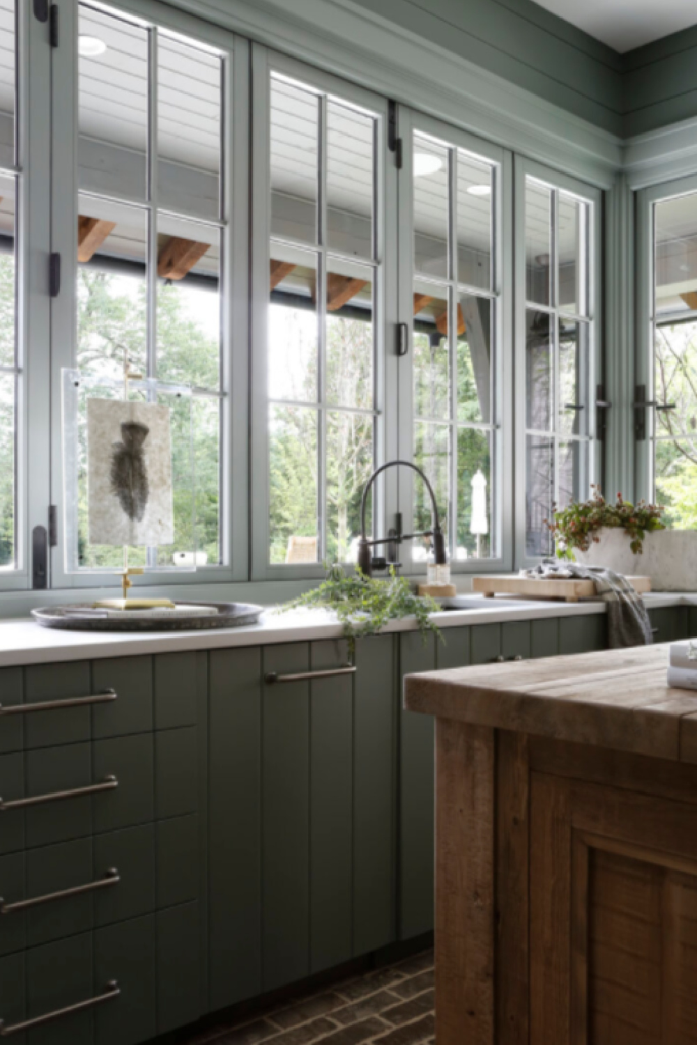 April Tomlin designed kitchen (Southern Charm) with SW Acacia Haze green paint color. #acaciahaze #greenkitchens