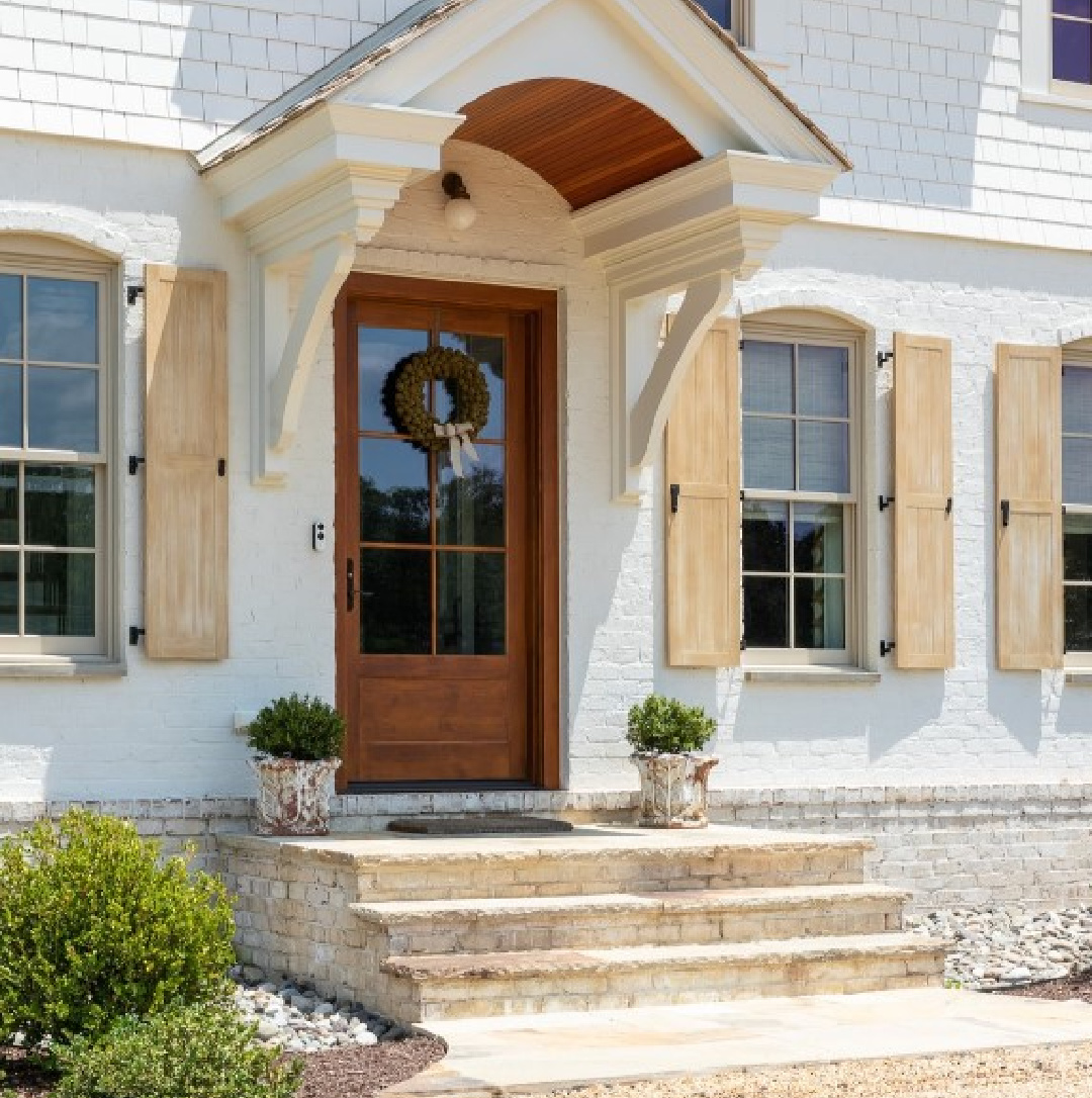 Benjamin Moore China White paint color on a French country white brick house exterior - Bummer Lamb Design (Christy Kosnic Photography). #chinawhitepaint