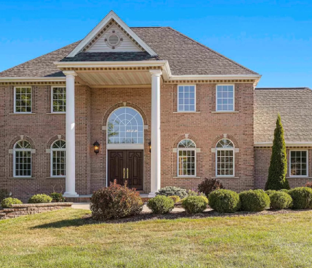 Brick Georgian style home exterior - Hello Lovely Studio.