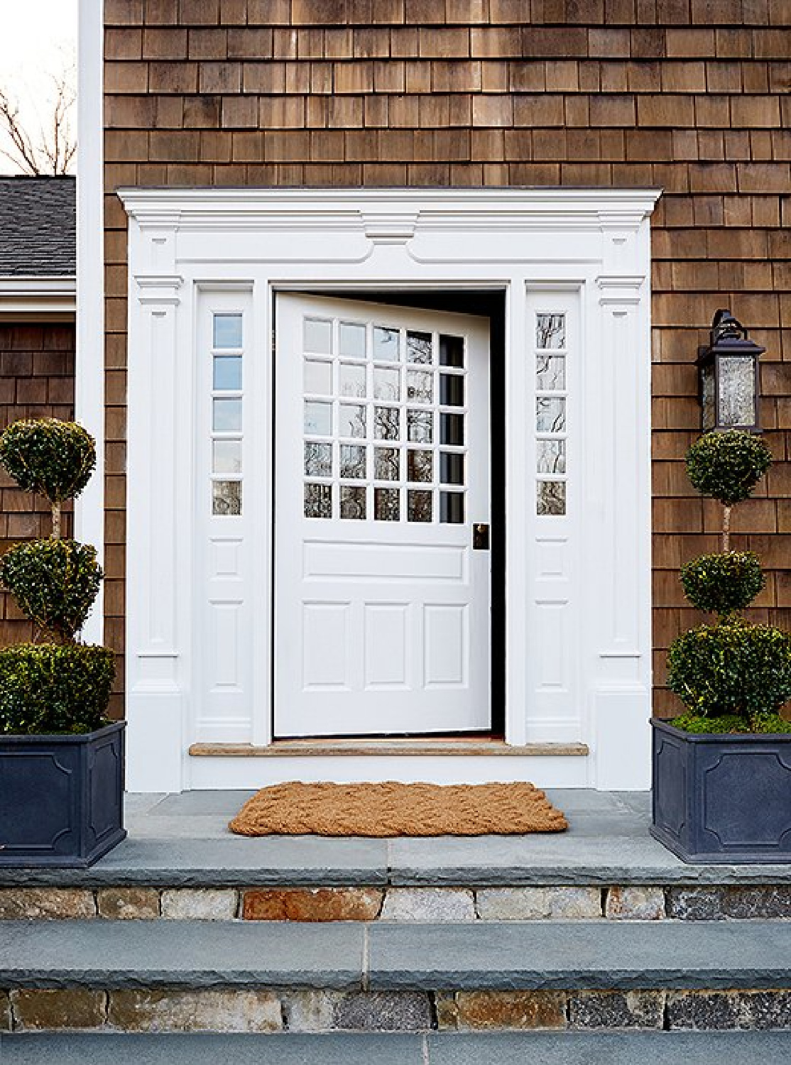 One Kings Lane Connecticut Farmhouse exterior front door and cedar shake shingles. #traditionalstyle #connecticutfarmhouse