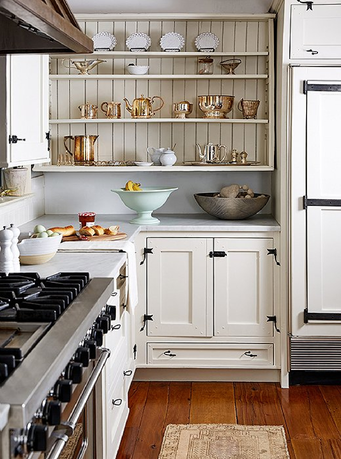 Classic white country kitchen in a New England farmhouse by OKL.