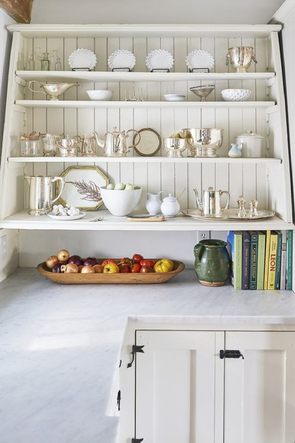 Classic white country kitchen in a New England farmhouse by OKL in Country Living.
