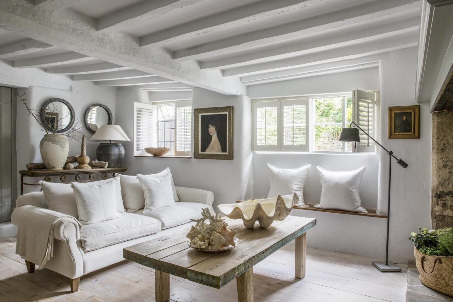 Charming and serene with pale colors and European antiques - a Cotswold cottage interior by Anton & K.