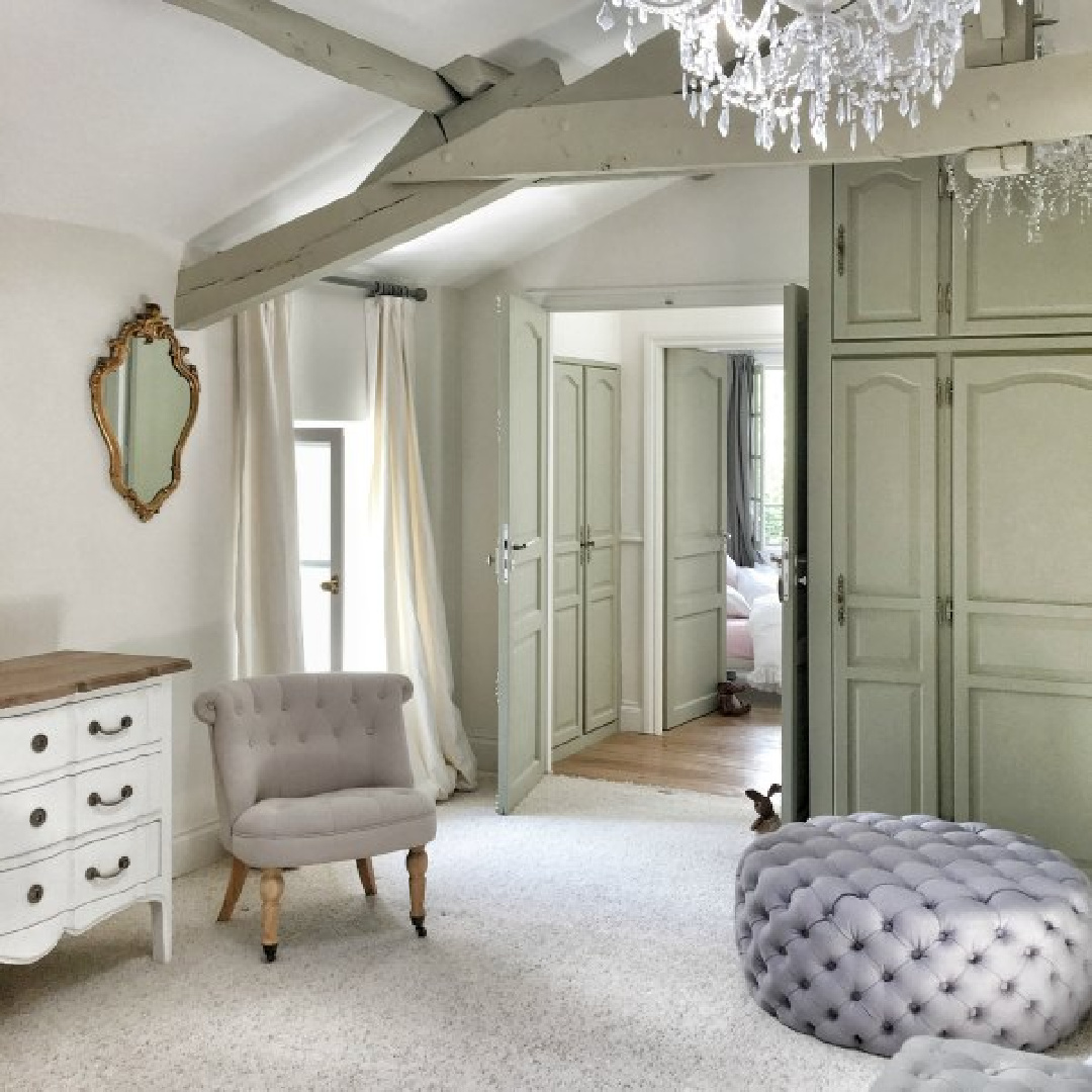 Tranquil, timeless and sophisticated design in a French farmhouse bedroom by Vivi et Margot with Farrow and Ball's Strong White on the walls and French Gray for trim.