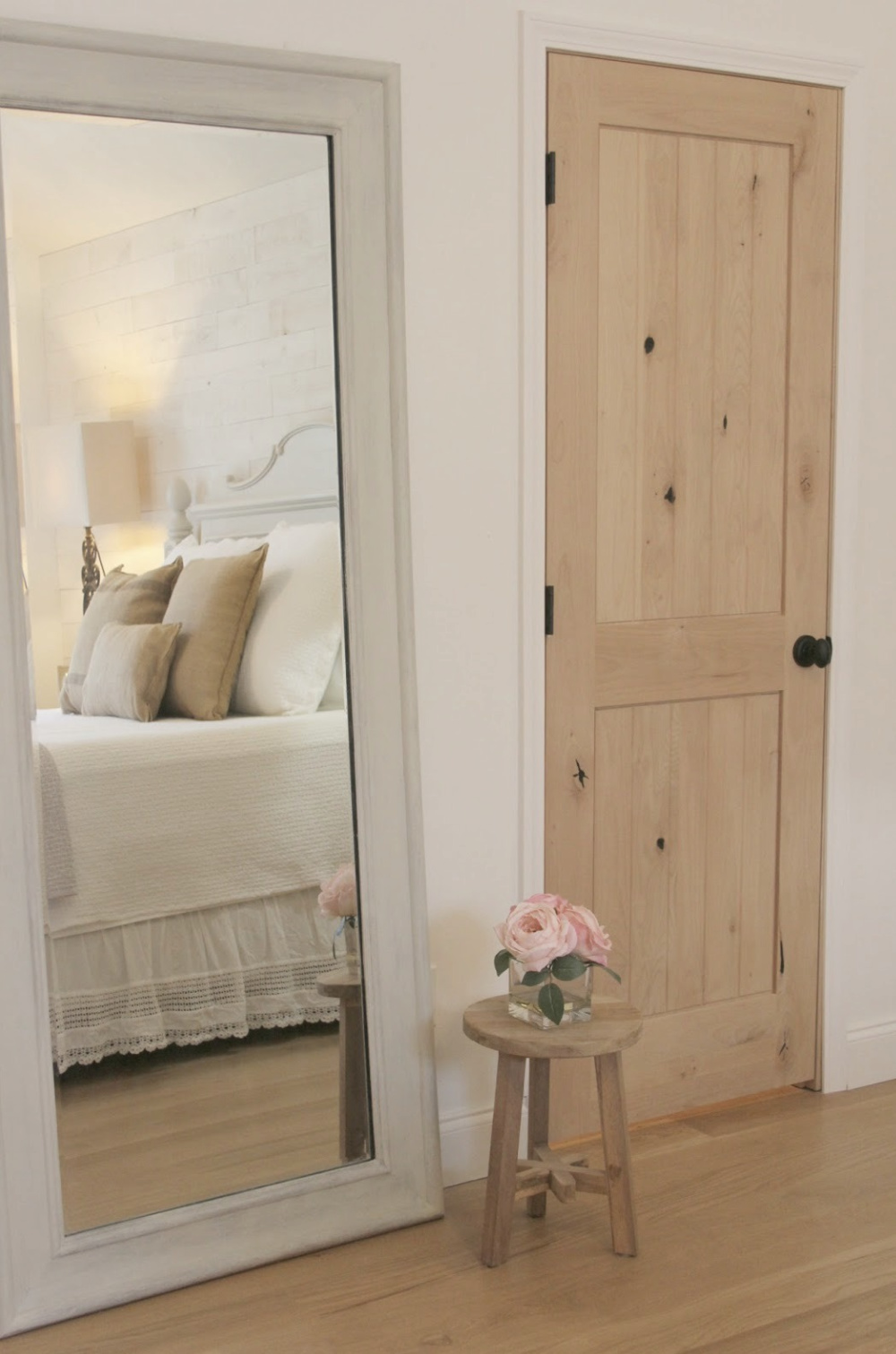 Romantic French Country bedroom with knotty alder door and shiplap wall #hellolovelystudio #romanticdecor #FrenchCountry