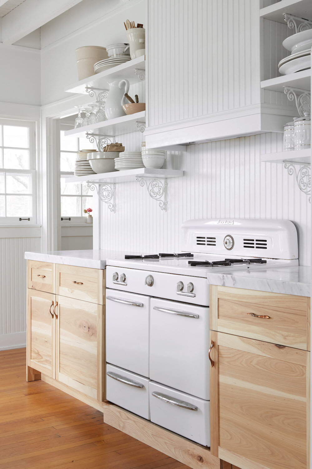 Leanne Ford designed white kitchen (Rinaman project) painted Delicate White by PPG.