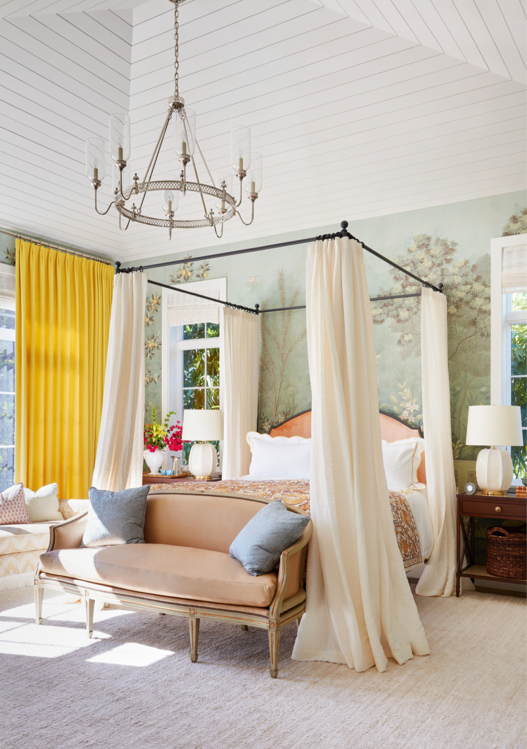 Summer Thornton designed fantasy bedroom with Gracie wallcovering (a scenic lemon-grove), yellow cashmere drapes, and four poster bed. From WONDERLAND (Rizzoli, 2022). Photo by Thomas Loof. #summerthornton #lemonwallpaper