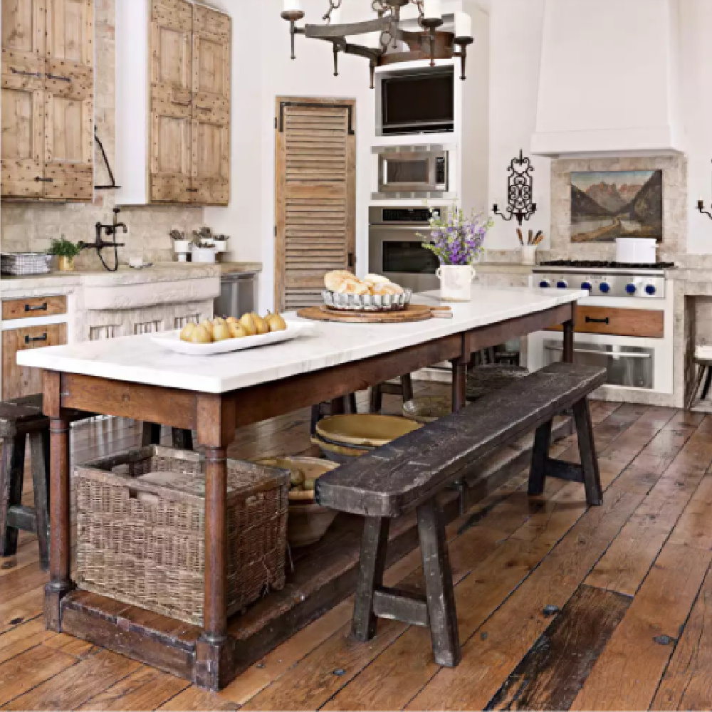 Rustic and refined European country kitchen with raw wood and antique stone - BHG.