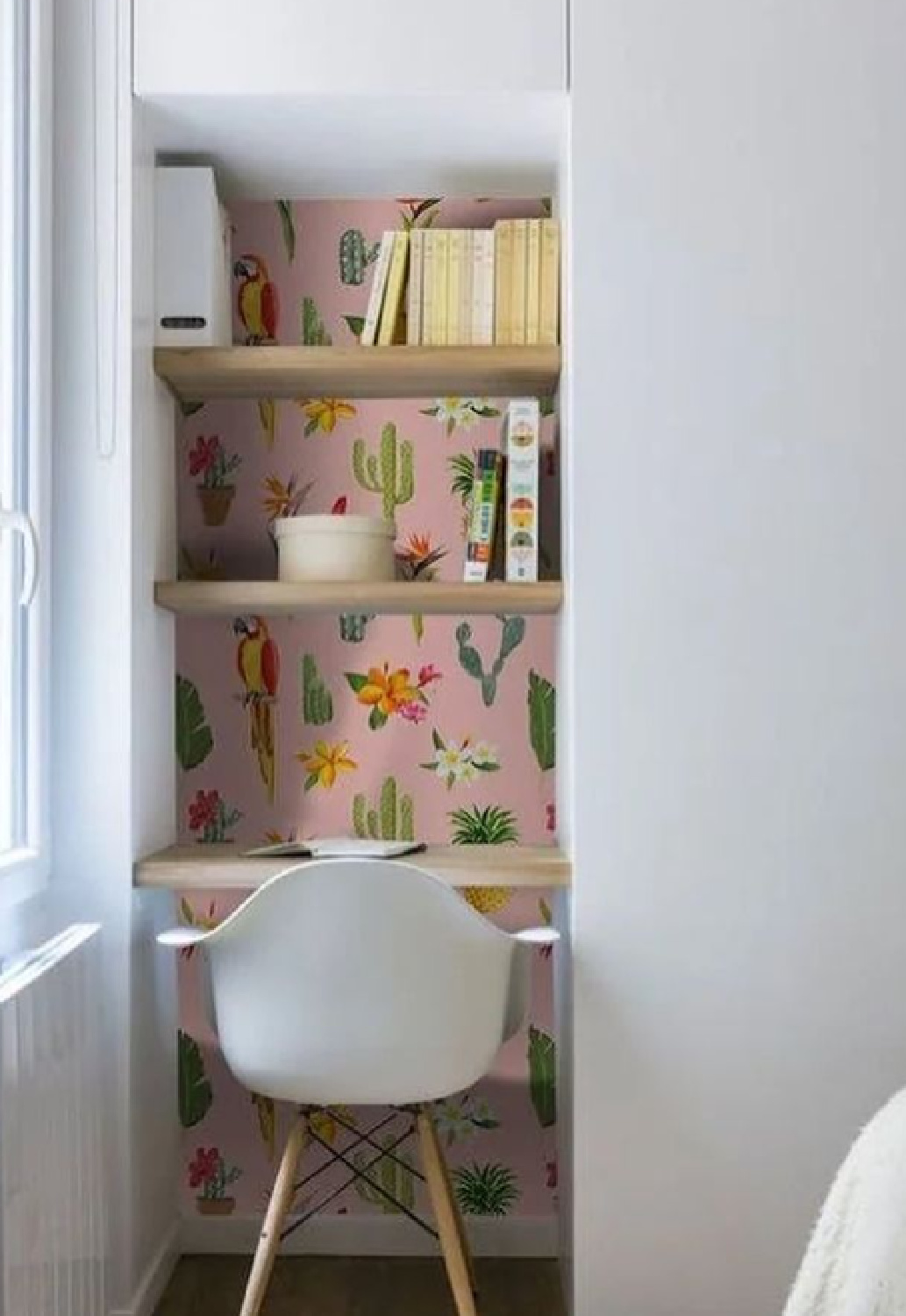 Beautifully designed cloffice with wallpaper, shelves, and modern chair - via @designhallyu. #cloffice #homeofficedesign #closetoffice