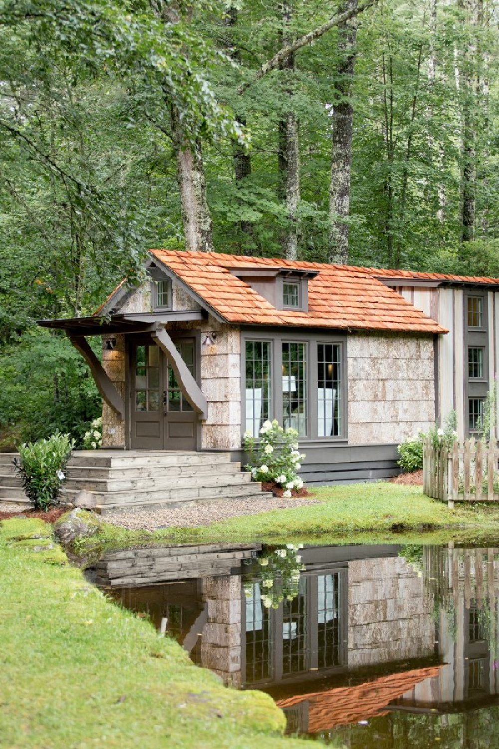 Jeffrey Dungan designed tiny house with finely crafted Low Country style -one of the cottages at The Retreat at Oakstone in Tennessee. #tinyhousedesign